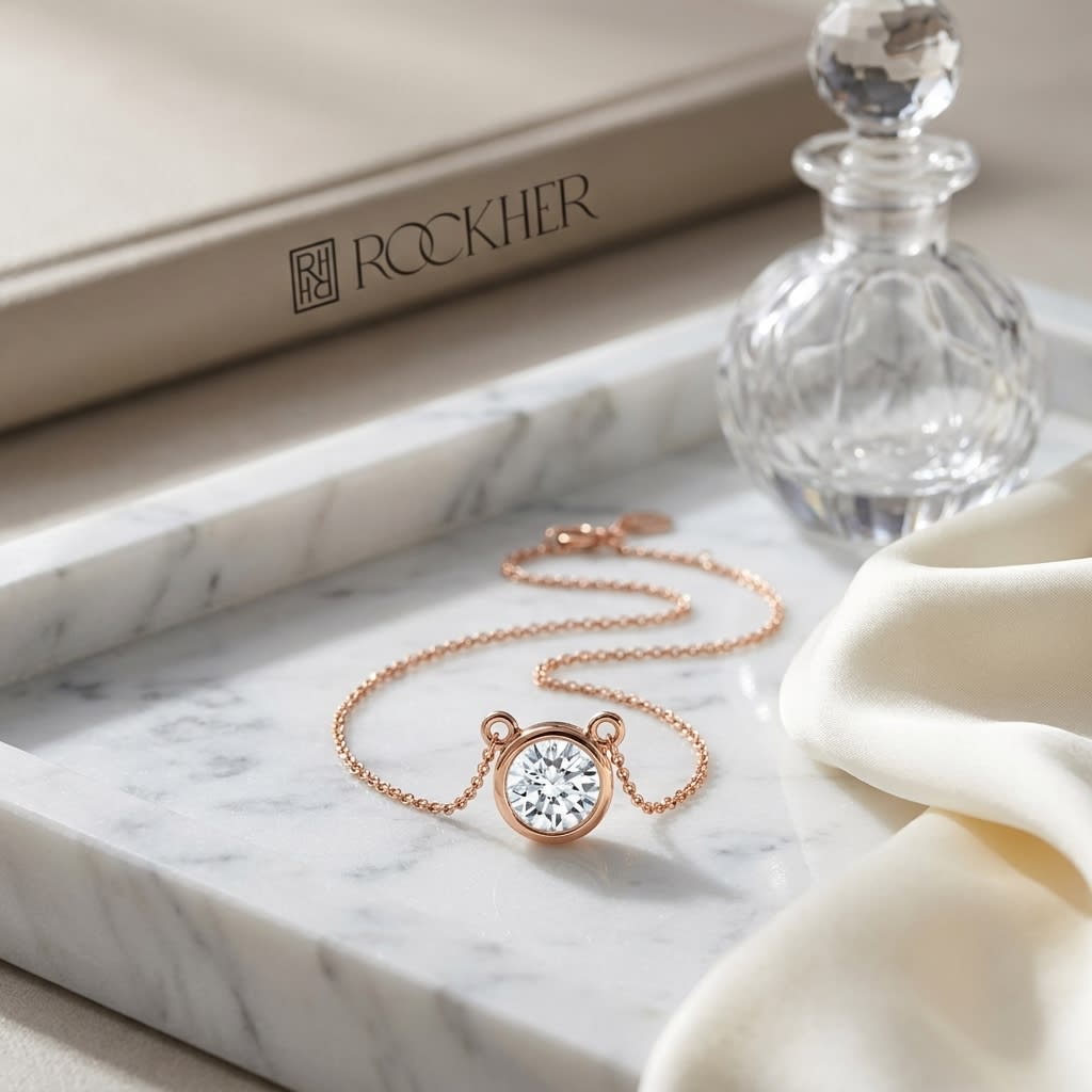 Natural Diamond Round Brilliant Solitaire Pendant in 14K Rose Gold, 4 ct. t.w., on marble vanity tray with silk