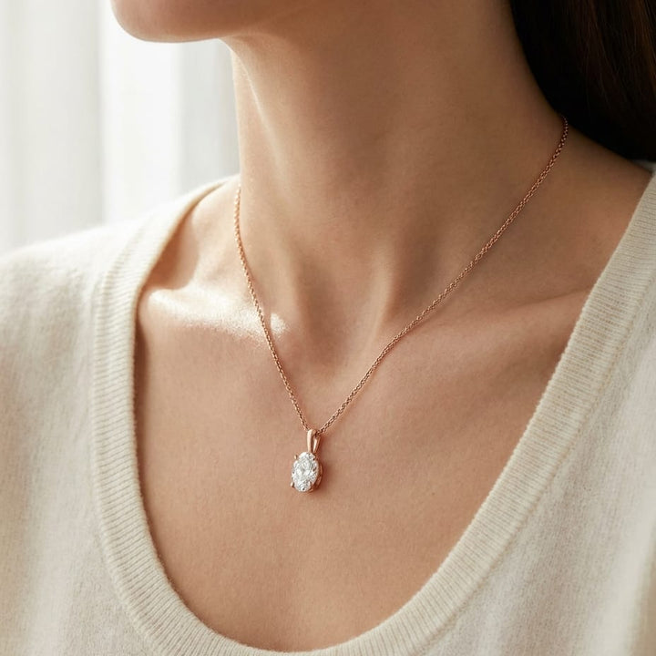 Natural Diamond Oval Solitaire Pendant in 14K Rose Gold, 2 ct. t.w., worn close-up portrait