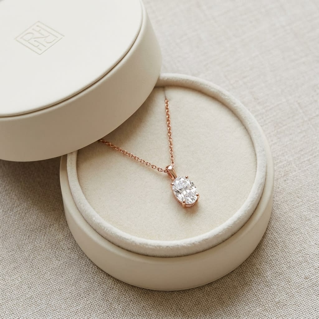 Natural Diamond Oval Solitaire Pendant in 14K Rose Gold, 2 ct. t.w., in navy velvet jewelry box