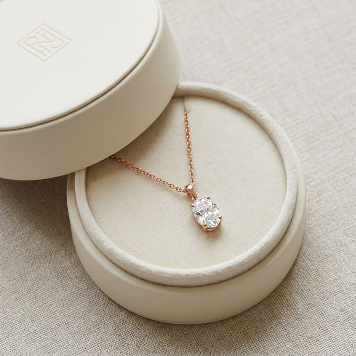 Natural Diamond Oval Solitaire Pendant in 14K Rose Gold, 2 ct. t.w., in navy velvet jewelry box