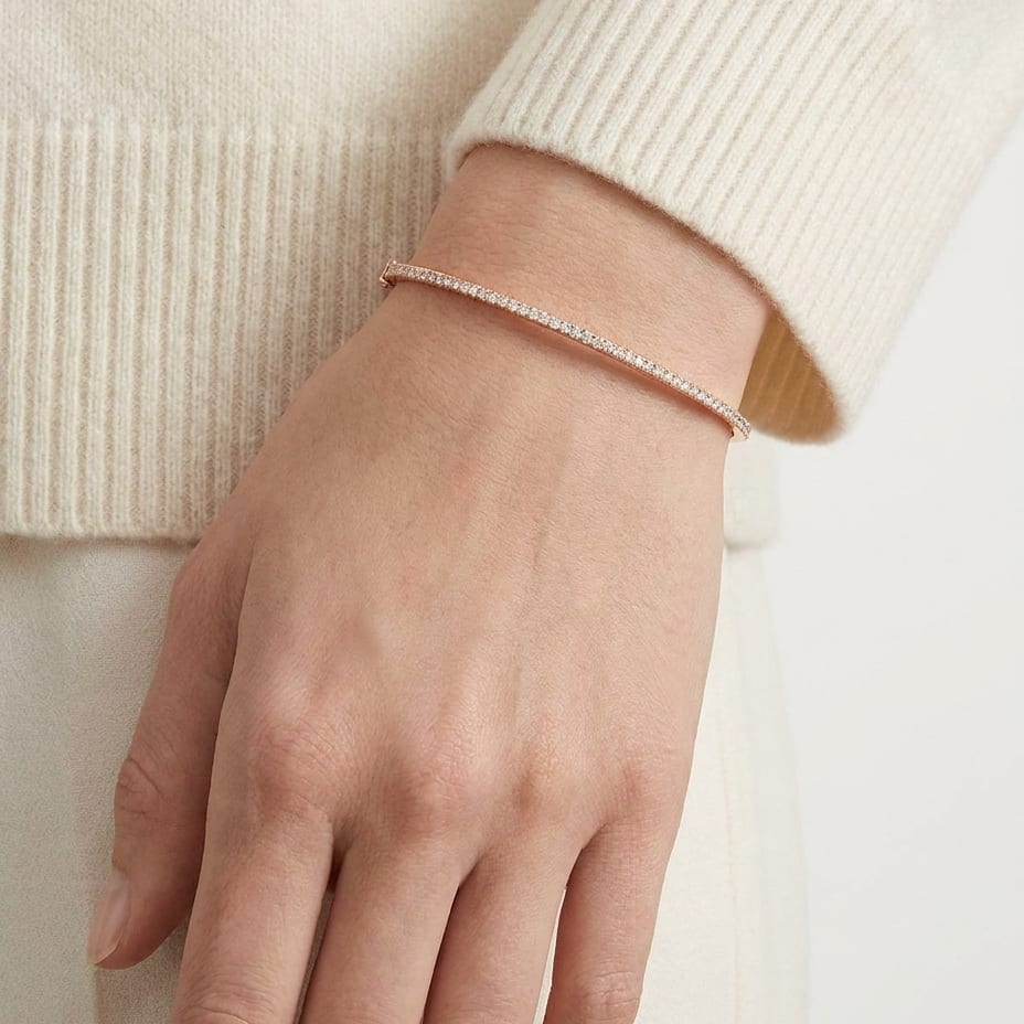 Pave Bangle in 14K Rose Gold, worn close-up portrait