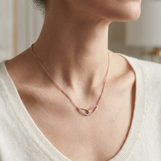Diamond Pave And High Polish Teardrop Interlink Necklace in 14K Rose Gold, 16-18 Inch, worn close-up portrait