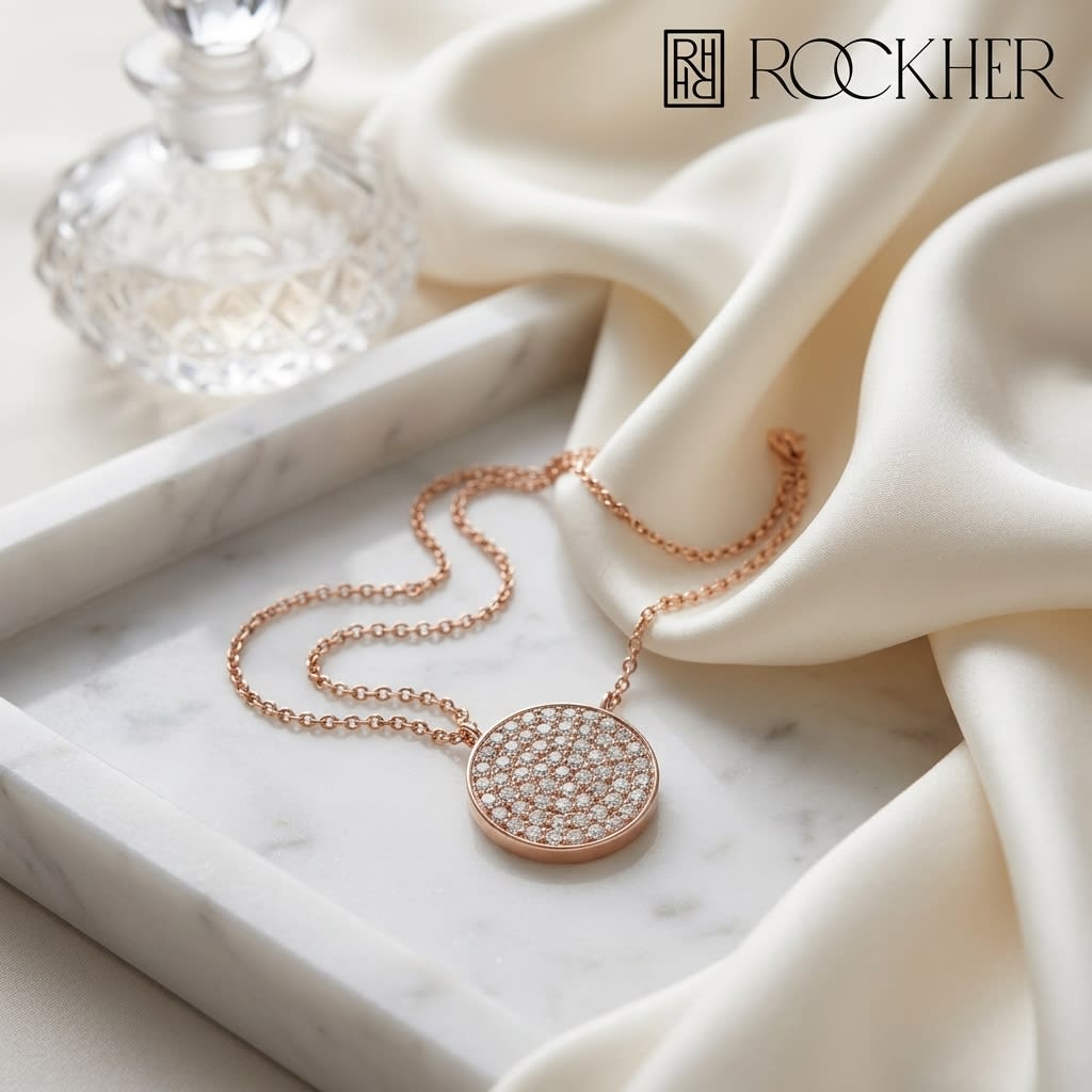 Diamond Pave Round Disk Necklace in 14K Rose Gold, on marble vanity tray with silk