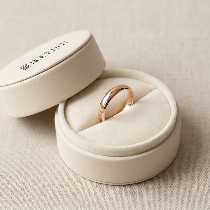 3mm Slightly Domed Traditional Oval Wedding Band in 14K Rose Gold, in navy velvet jewelry box