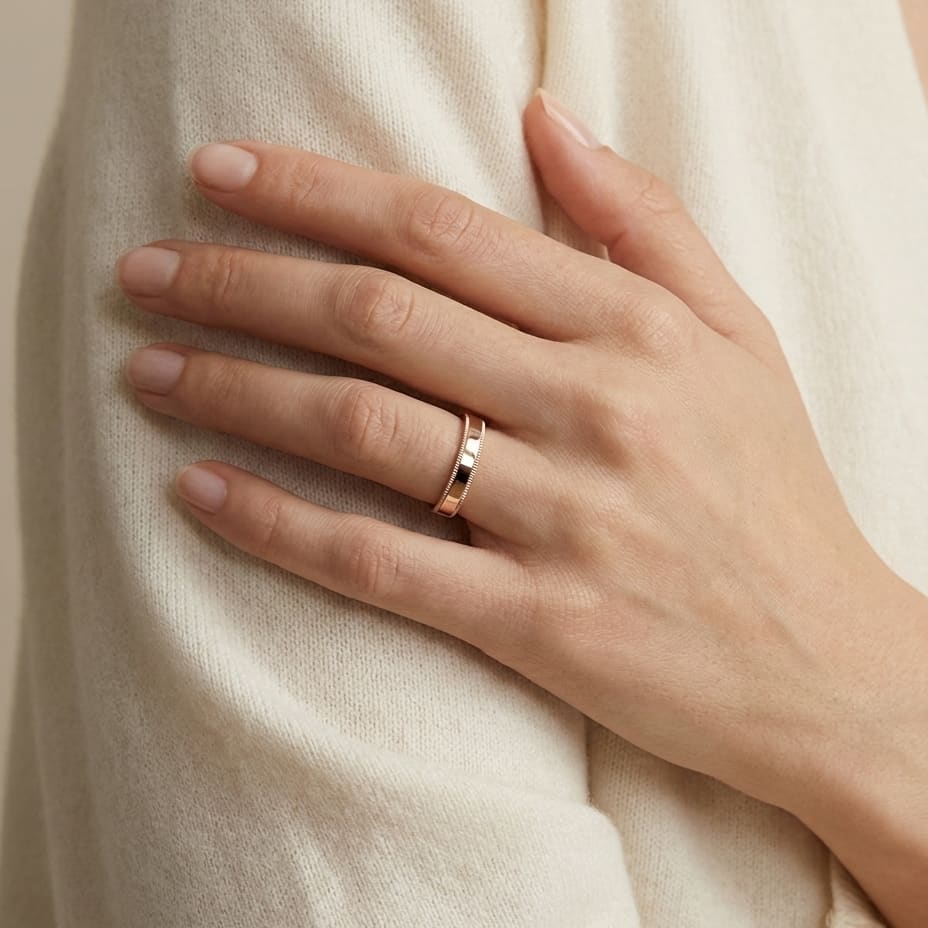 4mm Flat Milgrain Comfort-Fit Wedding Band in 14K Rose Gold, worn on hand, full view