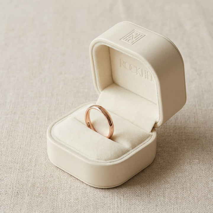 2.5mm Slightly Domed Comfort-Fit Wedding Band in 14K Rose Gold, in navy velvet jewelry box