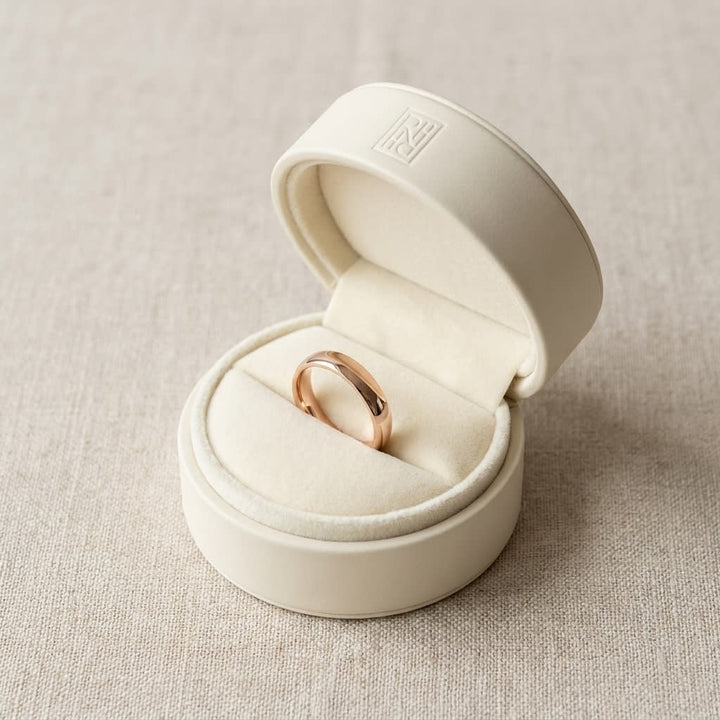 4mm Slightly Domed Comfort-Fit Wedding Band in 14K Rose Gold, in navy velvet jewelry box