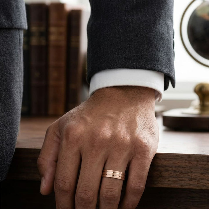 6mm Satin Finish Parallel Center Cut Carved Wedding Band in 14K Rose Gold, worn on hand, masculine full view