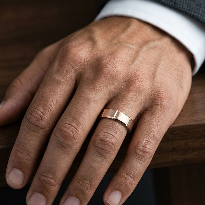 6mm Satin Finish Grooves Carved Wedding Band in 14K Rose Gold, worn on hand, masculine close-up