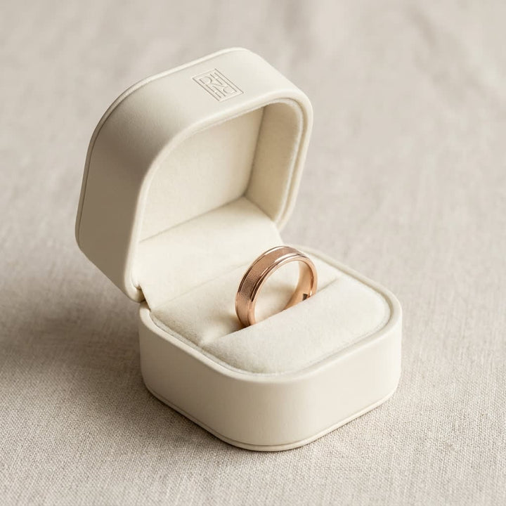 4mm Wired Finish High Polished Round Edge Carved Wedding Band in 14K Rose Gold, in navy velvet jewelry box