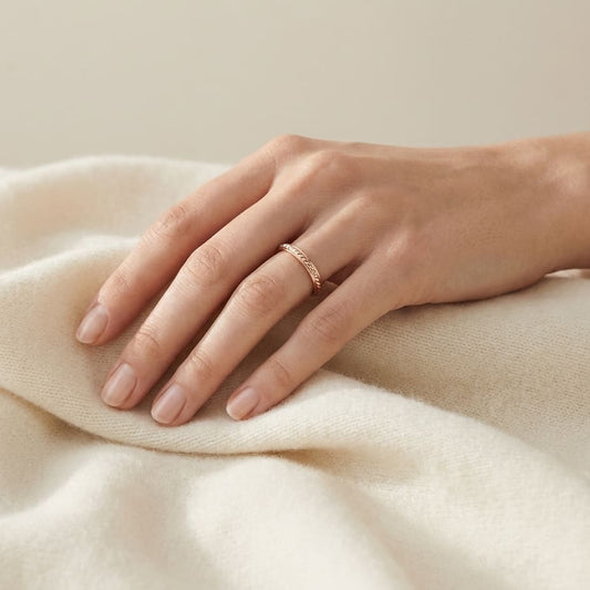 2mm High Polish Carved Wedding Band in 14K Rose Gold, worn on hand, full view