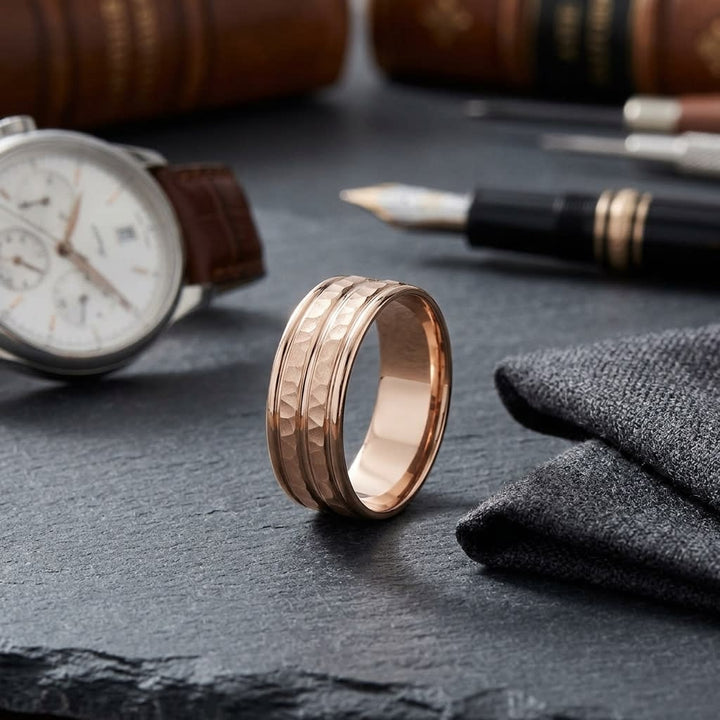 7.5mm High Polish Round Edge Carved Wedding Band in 14K Rose Gold, on walnut surface with pocket square