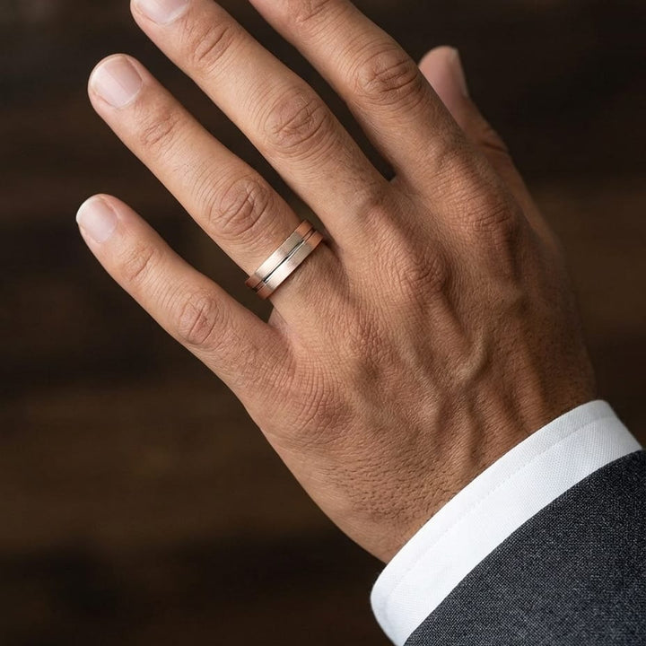 6mm Satin Finish High Polished Center Cut Carved Wedding Band in 14K Rose Gold, worn on hand, masculine close-up