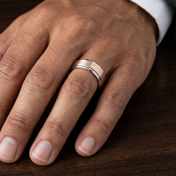 8mm Satin Finish High Polished Beveled Edge Carved Wedding Band in 14K Rose Gold, worn on hand, masculine close-up