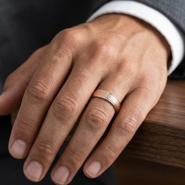 4.5mm Round Edge Mesh Center Carved Wedding Band in 14K Rose Gold, worn on hand, masculine close-up