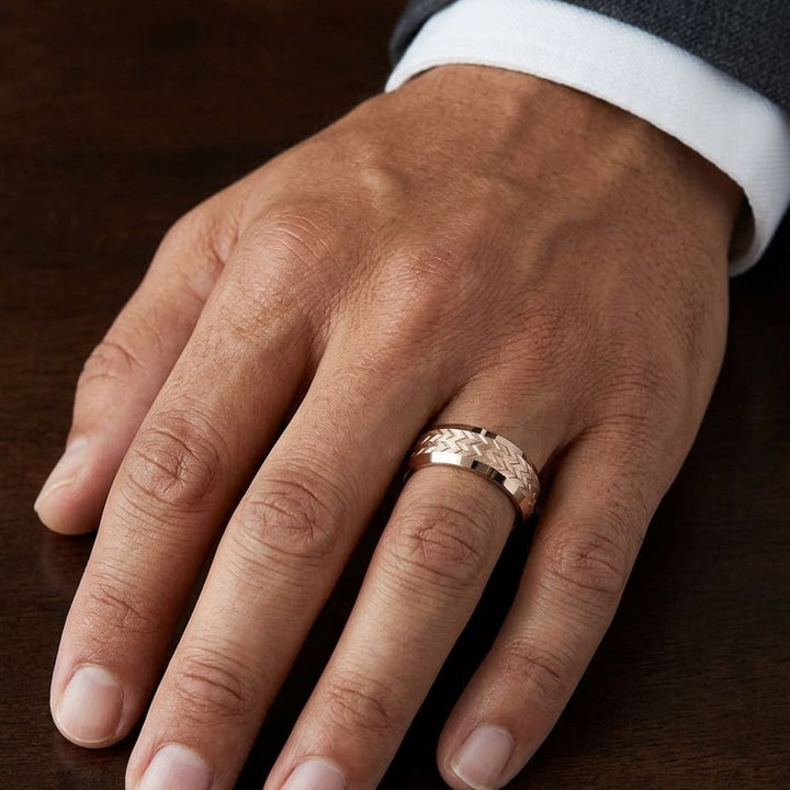 8mm Beveled Edge Treaded Carved Wedding Band in 14K Rose Gold, worn on hand, masculine close-up