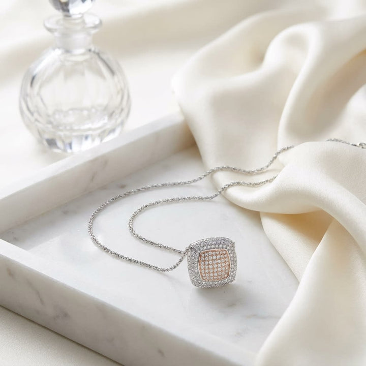 Diamond Pave Square Pendant In 14k Two Tone Gold (9/10 Ct.tw.), on marble vanity tray with silk