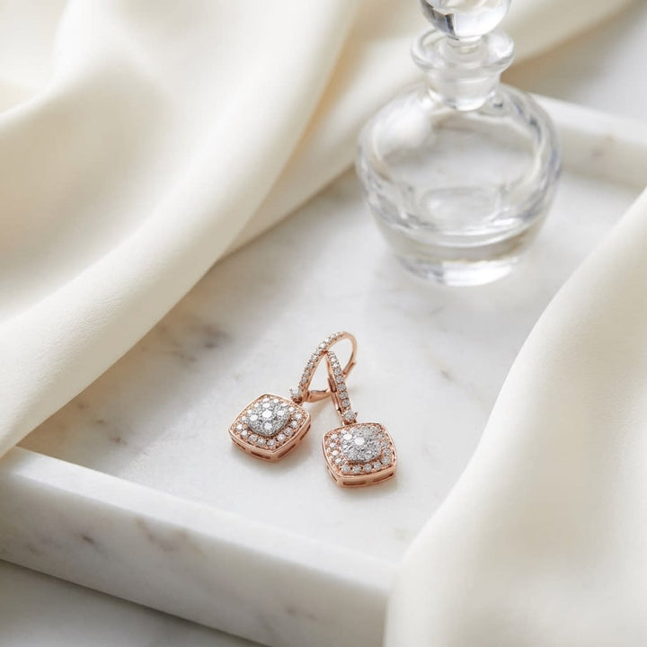 Diamond Pave Cluster Cushion Shaped Earrings In 14k Two Tone Gold (2/3 Ct.tw.), on marble vanity tray with silk
