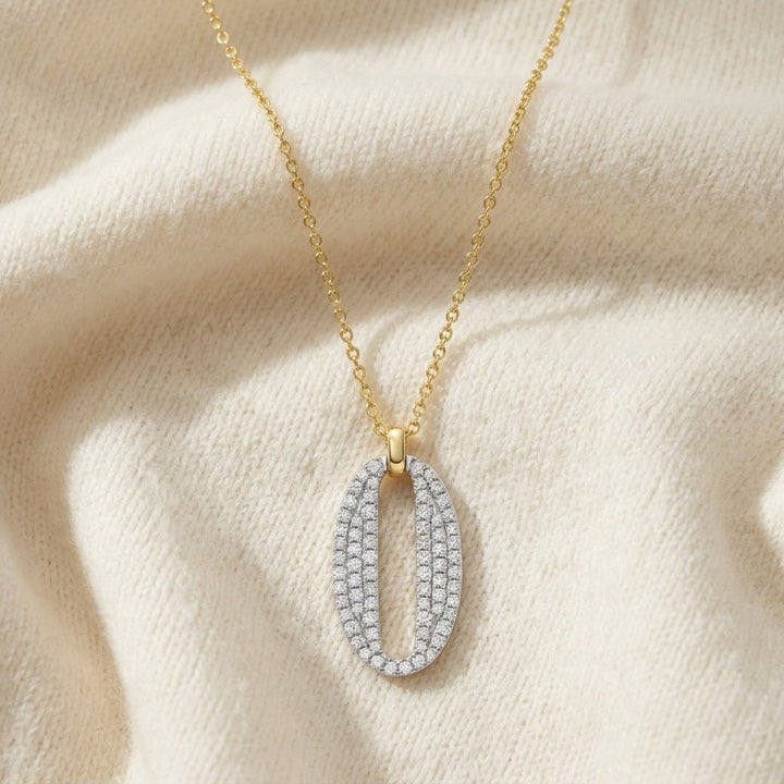 Diamond Pave Oval Pendant in 14K Two-Tone Gold - flat lay