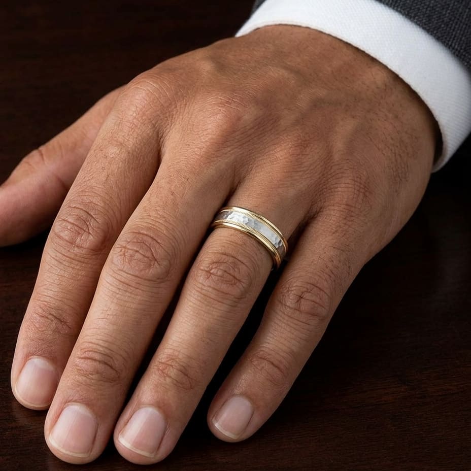 6mm Hammered Finish Milgrain Carved Wedding Band in 14K Two-Tone Gold, worn on hand, masculine close-up