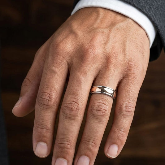 6mm High Polish Carved Wedding Band in 14K Two-Tone Gold, worn on hand, masculine close-up