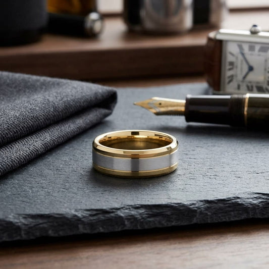 6mm Drop Bevel Satin Finish Carved Wedding Band in 14K Two-Tone Gold, on walnut surface with pocket square