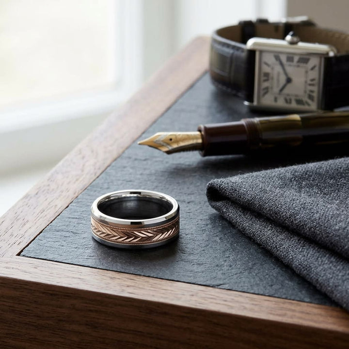 8mm Drop Bevel Wheat Pattern Carved Wedding Band in 14K Two-Tone Gold, on walnut surface with pocket square