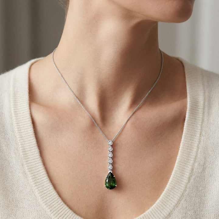 Green Tourmaline Pendant in 14K White Gold, worn close-up portrait