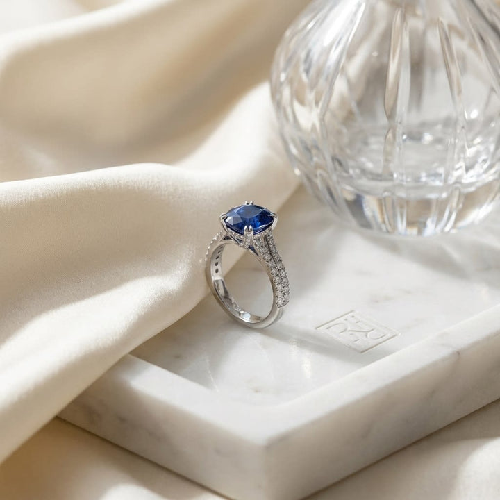 Sapphire And Diamond Layered Scallop Edge Band In 14k White Gold 0.45ctw, on marble vanity tray with silk