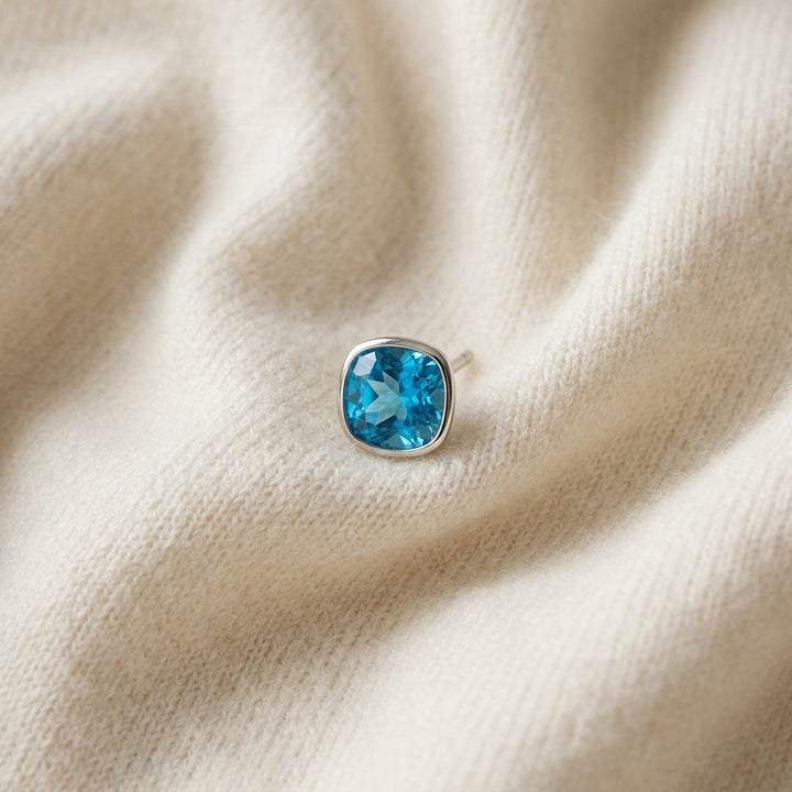 Blue Topaz Round 4-Prong Stud Earrings with Screwbacks 6mm in 14K White Gold - flat lay