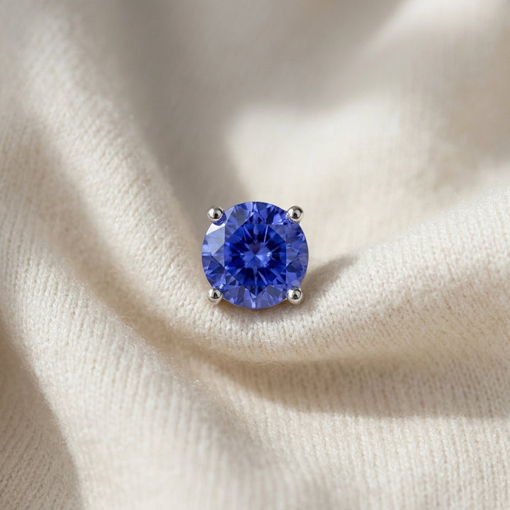 Tanzanite Round 4-Prong Stud Earrings with Screwbacks 6mm in 14K White Gold - flat lay