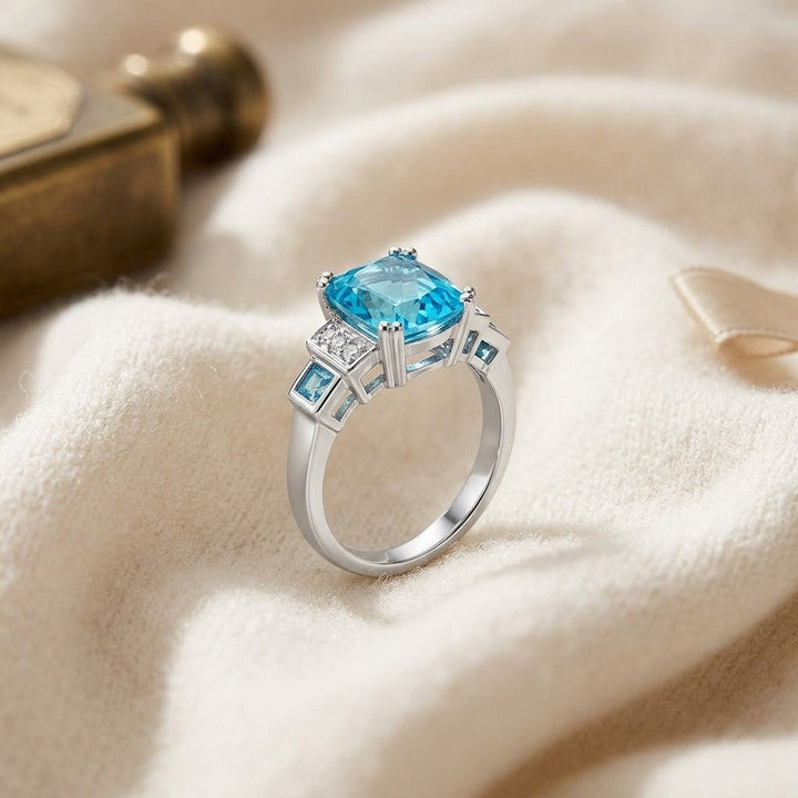 Swiss Blue Topaz & Diamond Step Ring 0.03ctw in 14K White Gold - flat lay