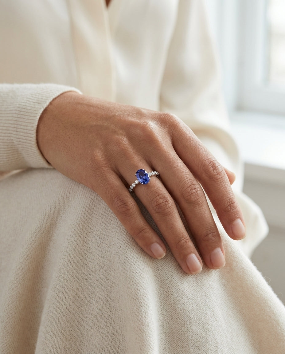 Tanzanite Oval Floating Diamond Ring in 14k White Gold 0.33ctw, worn close-up portrait