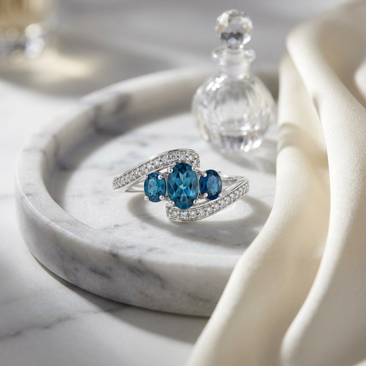 London Blue Topaz Three Stone Swirl Ring 1/8ctw in 14K White Gold - lifestyle