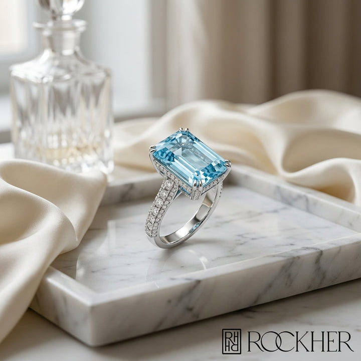 Aquamarine and Diamond Corrugated Shank Ring in 14k White Gold 0.08ctw, on marble vanity tray with silk
