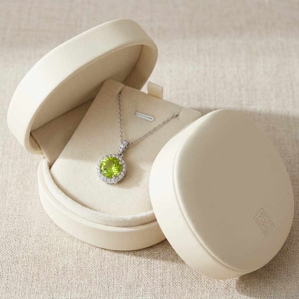 Peridot Halo Pendant in 14K White Gold, in navy velvet jewelry box