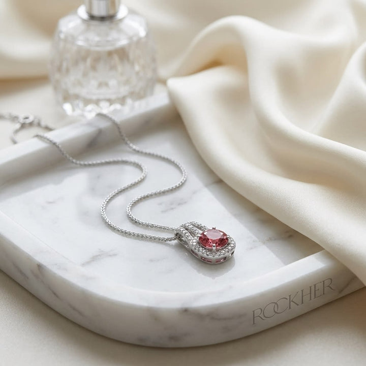 Pink Tourmaline Round Brilliant Pendant in 14K White Gold, on marble vanity tray with silk