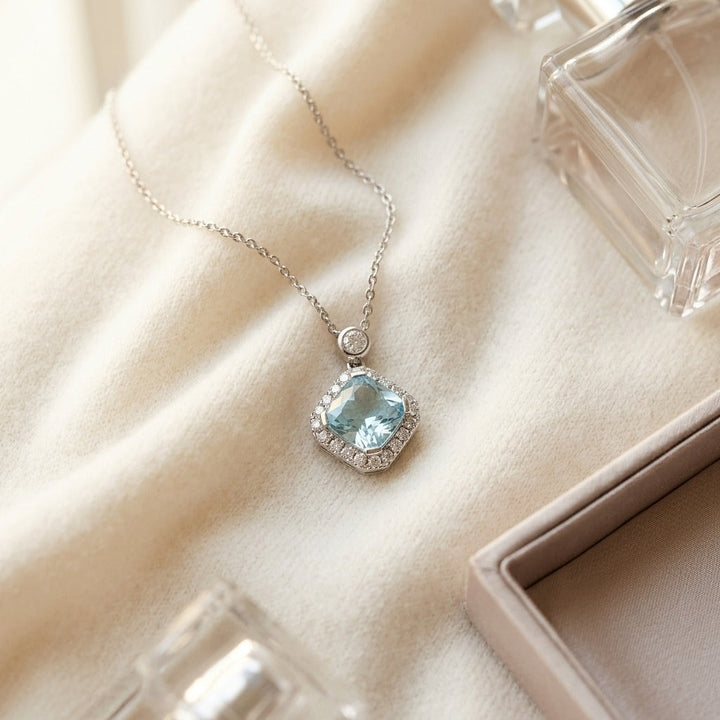 Blue Topaz & Diamond Cushion Kite Pendant 17 Inch Baby Curb Chain in 14K White Gold - flat lay