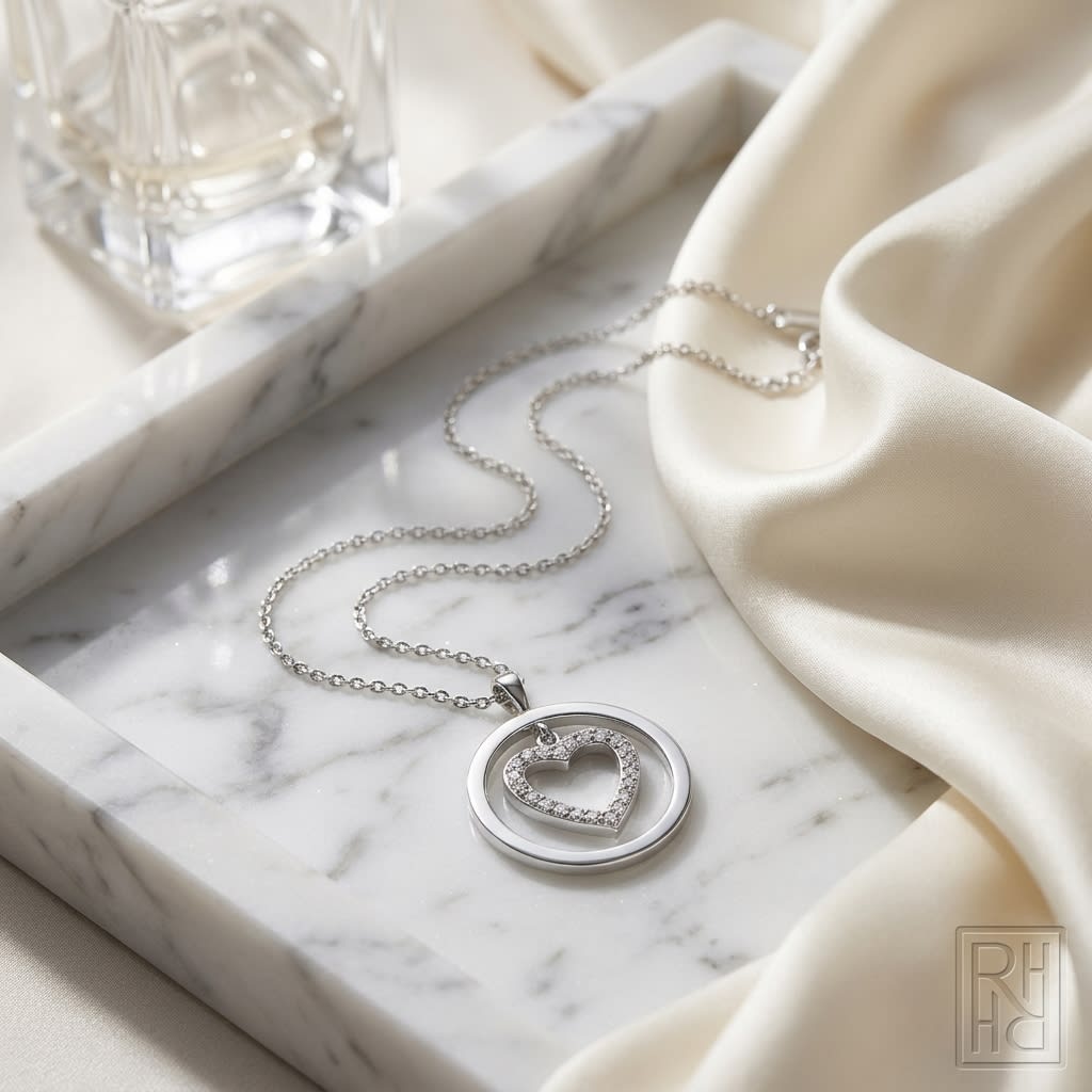 Natural Diamond Heart Shape Pendant in 14K White Gold, on marble vanity tray with silk