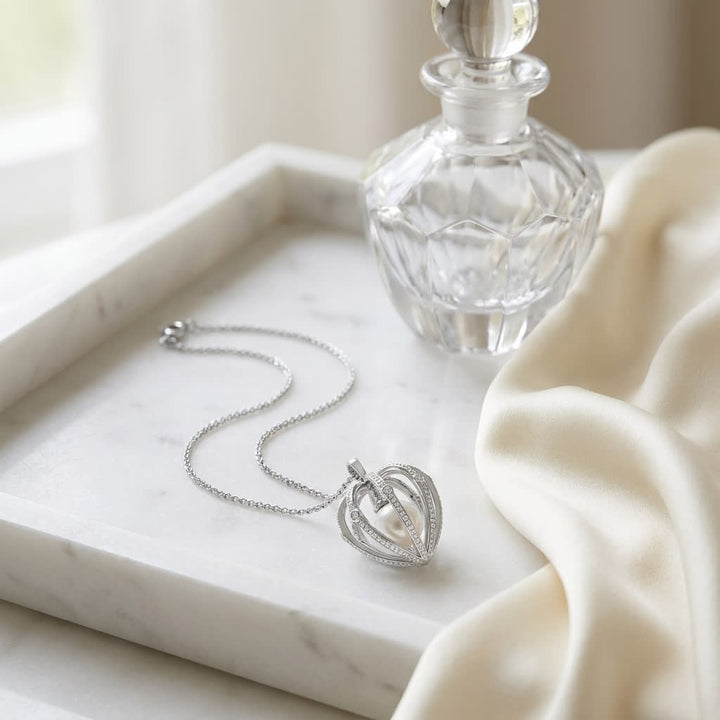 Cultured Pearl Pear Shape Pendant in 14K White Gold, on marble vanity tray with silk