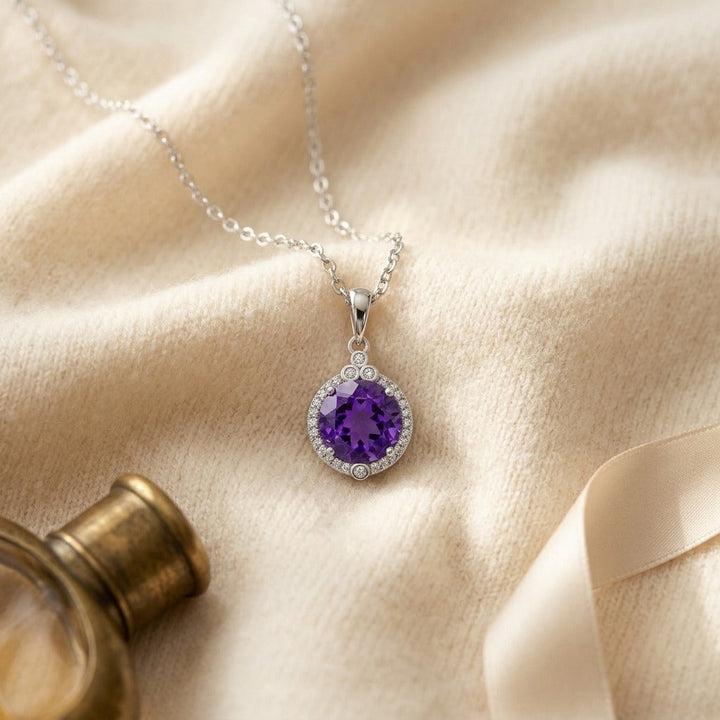 Amethyst & Diamond Round Halo Pendant with Bezel Accent in 14K White Gold - flat lay