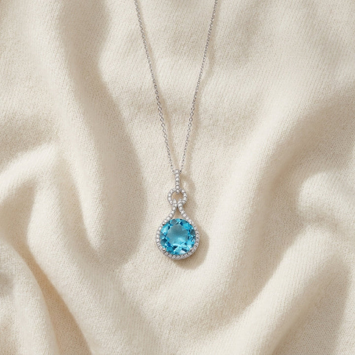 Blue Topaz & Diamond Doorknocker Pendant in 14K White Gold - flat lay