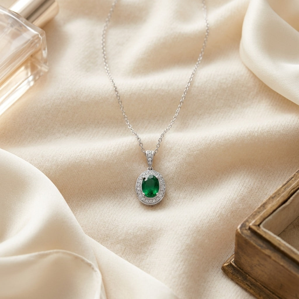 Emerald & Diamond Oval Halo Pendant 16 in Rolo Chain in 14K White Gold - flat lay
