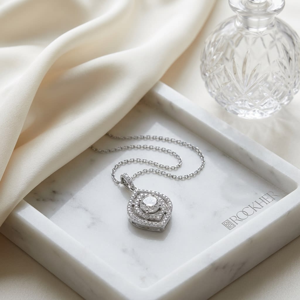 Natural Diamond Marquise Pendant in 14K White Gold, on marble vanity tray with silk