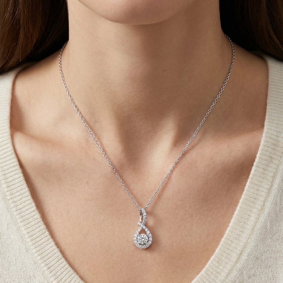 Natural Diamond Round Brilliant Pendant in 14K White Gold, worn close-up portrait
