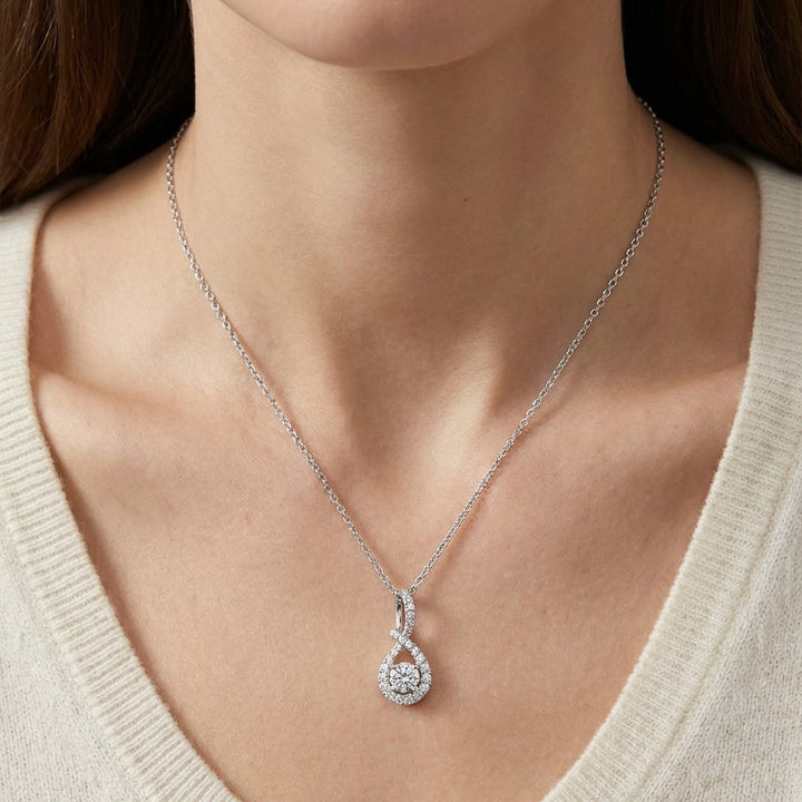 Natural Diamond Round Brilliant Pendant in 14K White Gold, worn close-up portrait
