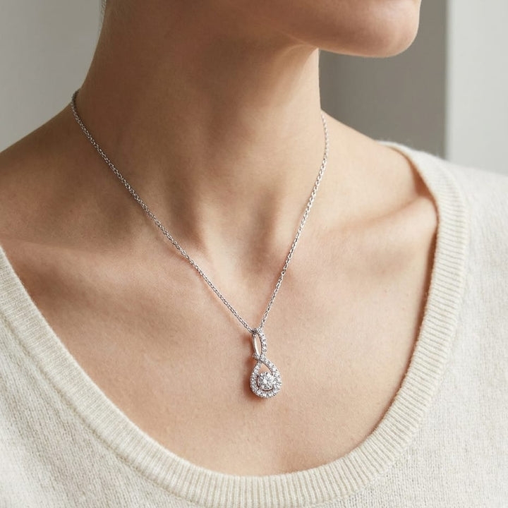 Natural Diamond Round Brilliant Pendant in 14K White Gold, worn close-up portrait