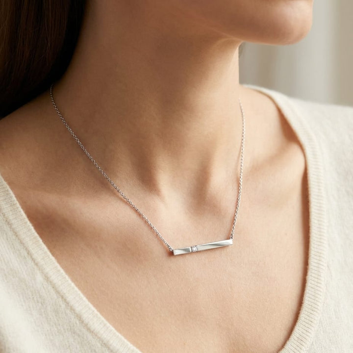 Diamond Bar Necklace in 14K White Gold 0.10ctw, worn close-up portrait