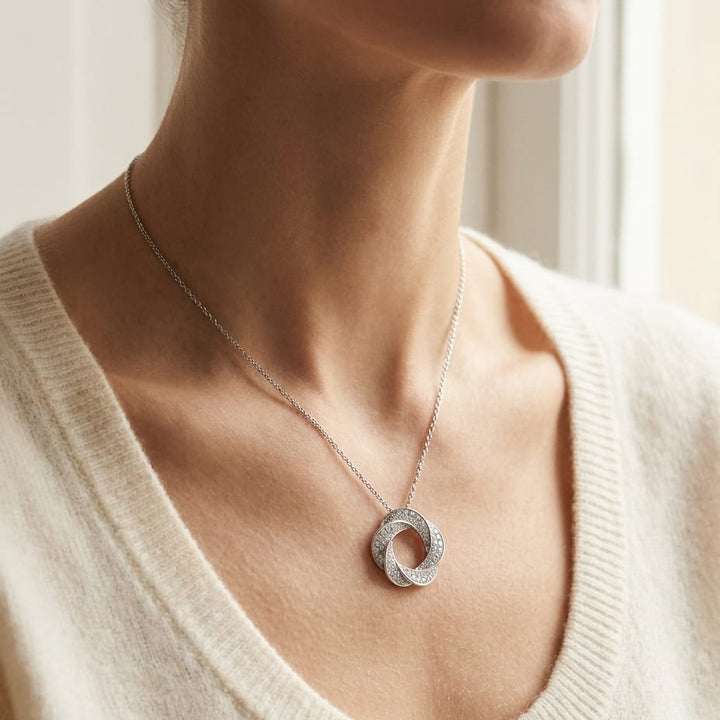 Natural Diamond Round Brilliant Pendant in 14K White Gold, worn close-up portrait