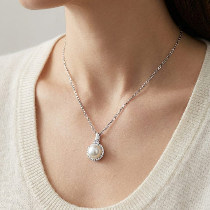 Freshwater Pearl Pear Shape Halo Pendant in 14K White Gold, worn close-up portrait